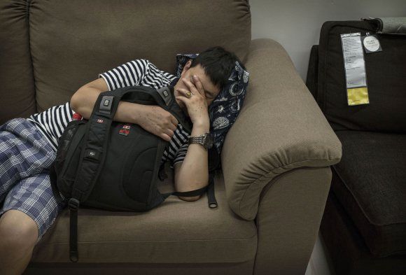  photo bizarre-photos-of-chinese-shoppers-napping-at-ikea5.jpg