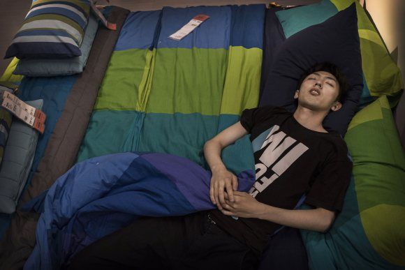  photo bizarre-photos-of-chinese-shoppers-napping-at-ikea7.jpg