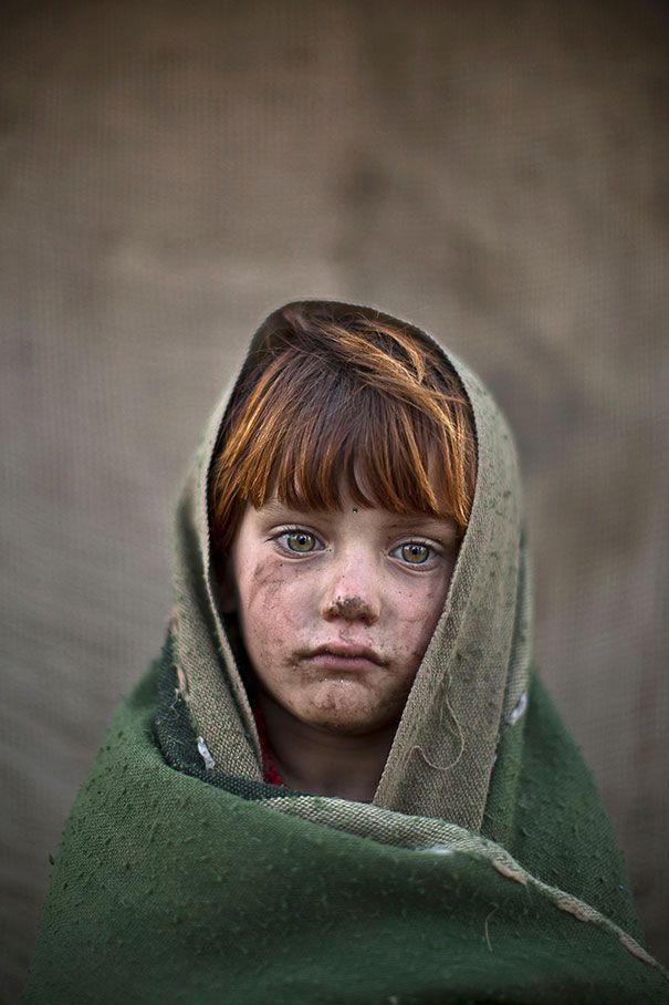  photo afghan-children-refugees-pakistan-muhammed-muheisen-12__605.jpg