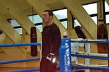 Sosnowski in ring ready to work mits with trainer