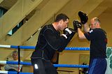 Albert Sosnowski training with mits