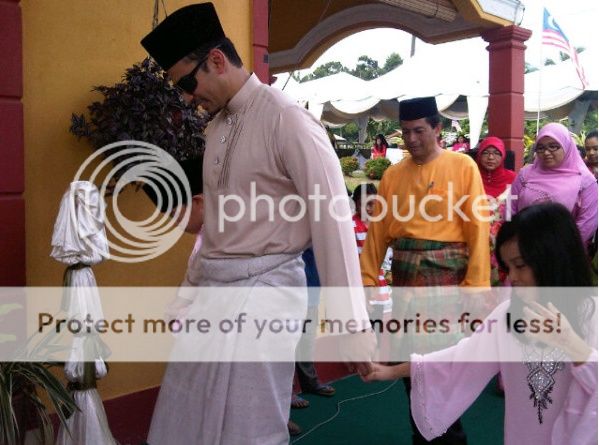 gambar pernikahan norman hakim memey suhaiza